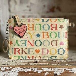 Dooney & Bourke Vintage Rainbow Logo Spellout Wristlet.
EUC